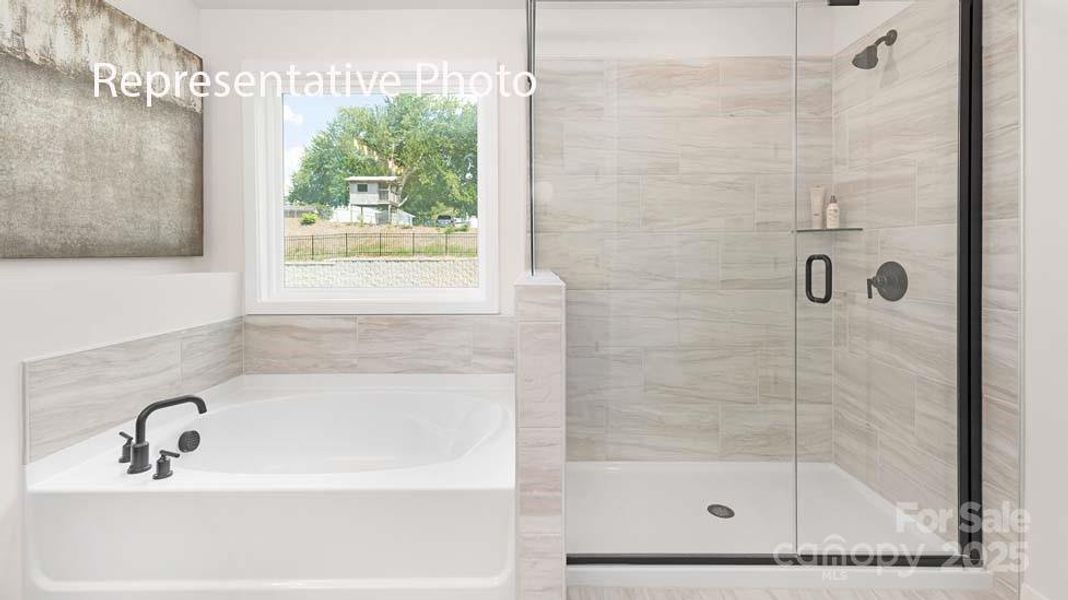 Furnished interior view inside a new home in Sanctuary at Southgate, Indian Trail (Image 23).