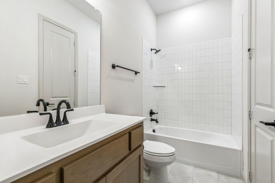 Representative furnished interior of a home built from the Brazos by Sandlin Homes in Bluffs at Northpointe, Fort Worth (Image 14).