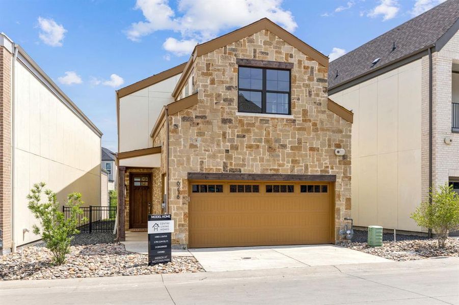 Front exterior of a new home in Merion at Midtown Park, Dallas, TX, highlighting curb appeal (Image 21). Front exterior of a new home in Merion at Midtown Park, Dallas, TX, highlighting curb appeal (Image 21).