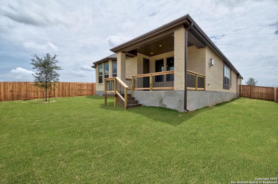 Front exterior of a new home in Homestead, Schertz, TX, highlighting curb appeal (Image 16). Front exterior of a new home in Homestead, Schertz, TX, highlighting curb appeal (Image 16).