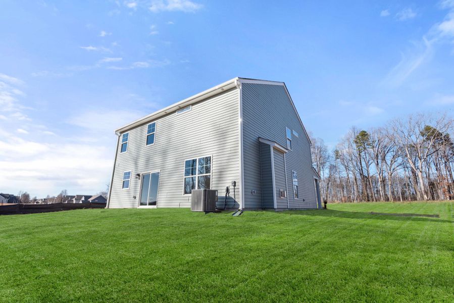 Exterior details and patio area of a home in Chandler Ridge, McLeansville (Image 20).