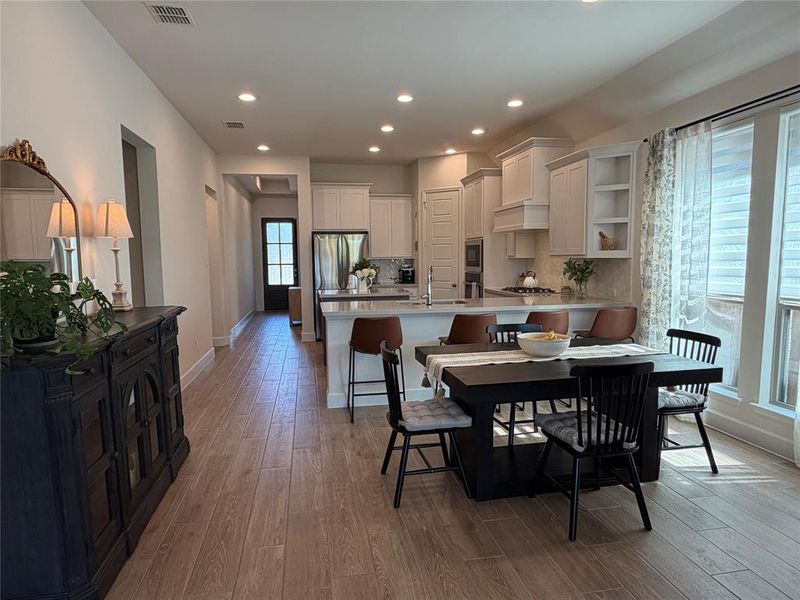 Easy-Care Plank Tile Flows Throughout the Main Areas Leading into a Bright and Airy Layout Designed for Seamless Living Easy-Care Plank Tile Flows Throughout the Main Areas Leading into a Bright and Airy Layout Designed for Seamless Living