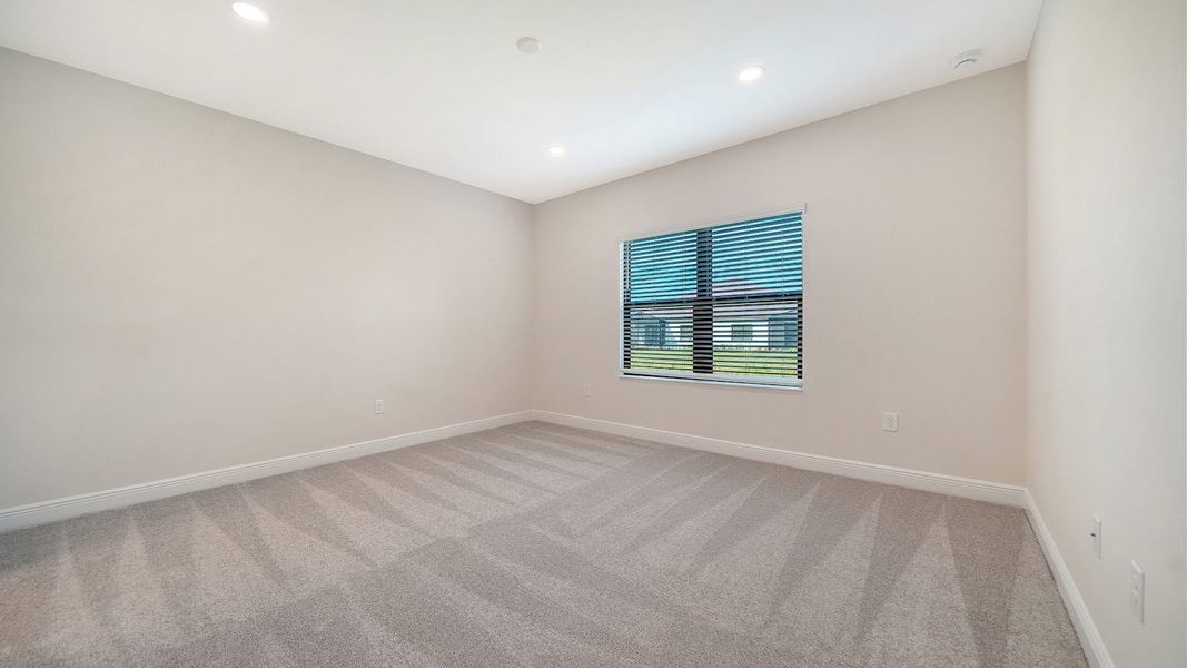 Spacious, unfurnished interior of a new home in Vistera of Venice Real Estate and Homes for Sale in Venice, FL - Neal Communities, Nokomis (Image 32).