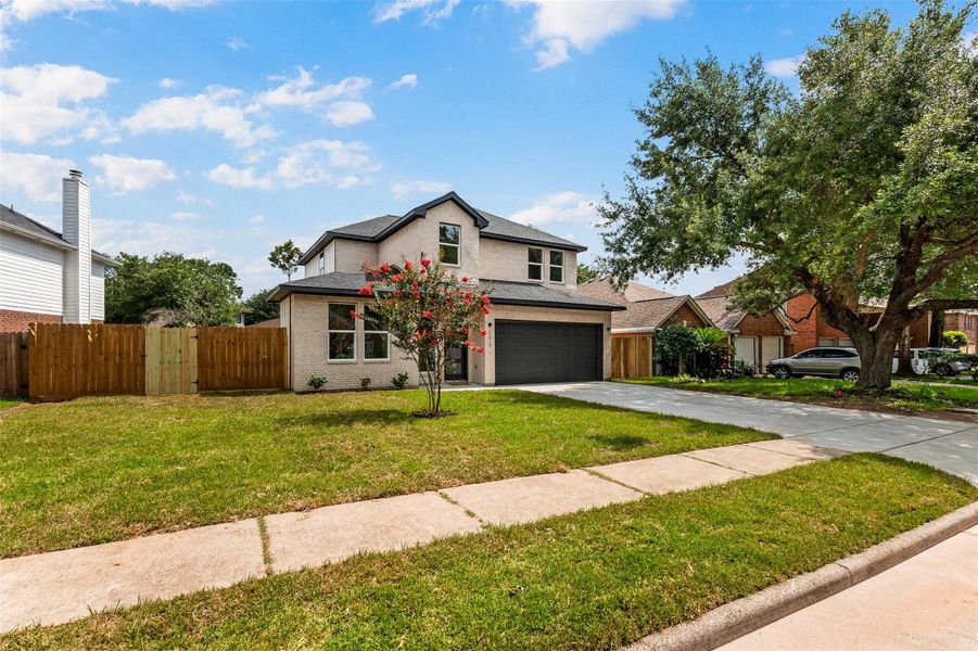 Front exterior of a new home in , Spring, TX, highlighting curb appeal (Image 26).