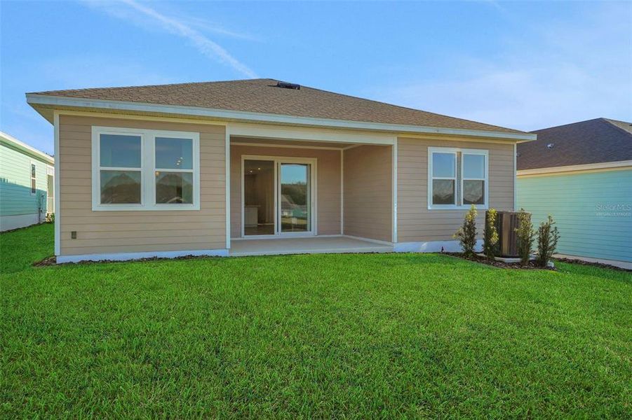 Exterior details and patio area of a home in Green Key Village, Lady Lake (Image 19). Exterior details and patio area of a home in Green Key Village, Lady Lake (Image 19).