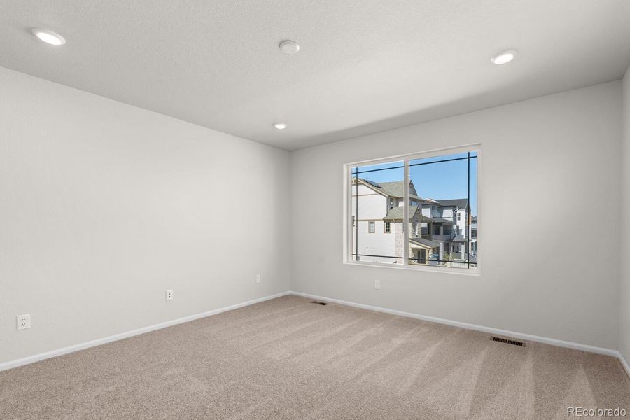 Spacious, unfurnished interior of a new home in The Villas Collection at Sterling Ranch, Littleton (Image 27).