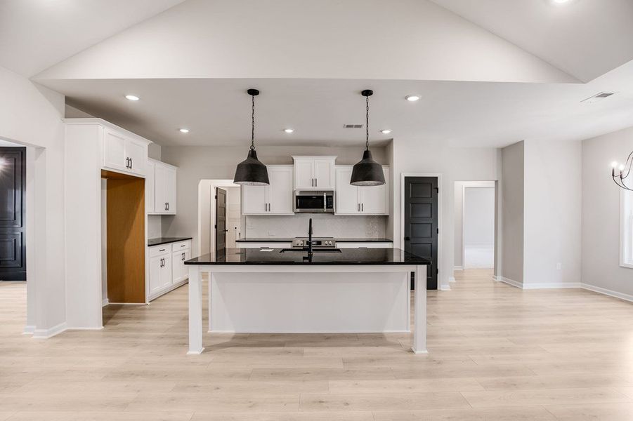 Furnished interior view inside a new home in LOVVORN ESTATES, Carrollton (Image 6).