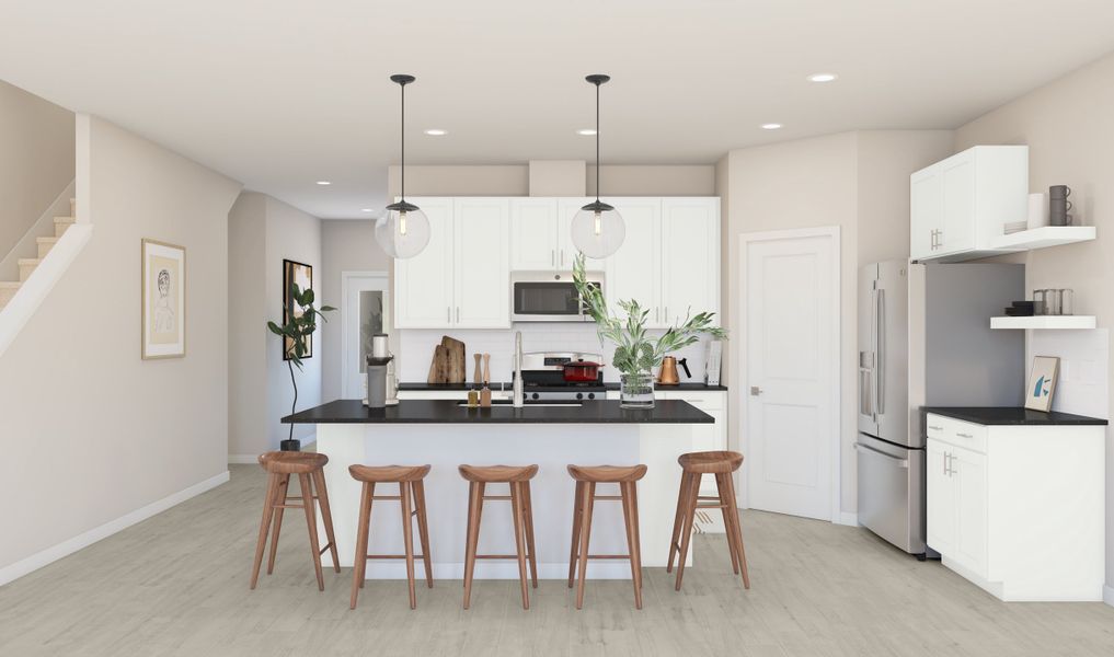 Kitchen with vast island & pendant lights