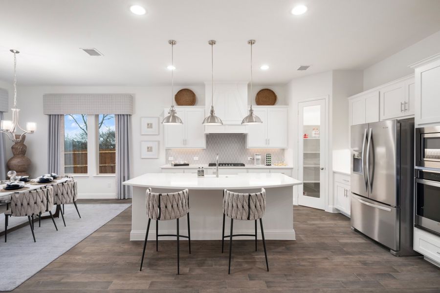 Representative furnished interior of a home built from the Kirby by UnionMain Homes in Lake Breeze, Lavon (Image 39).
