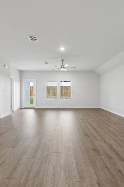 Living Room in the Oscar home plan by Trophy Signature Homes – REPRESENTATIVE PHOTO