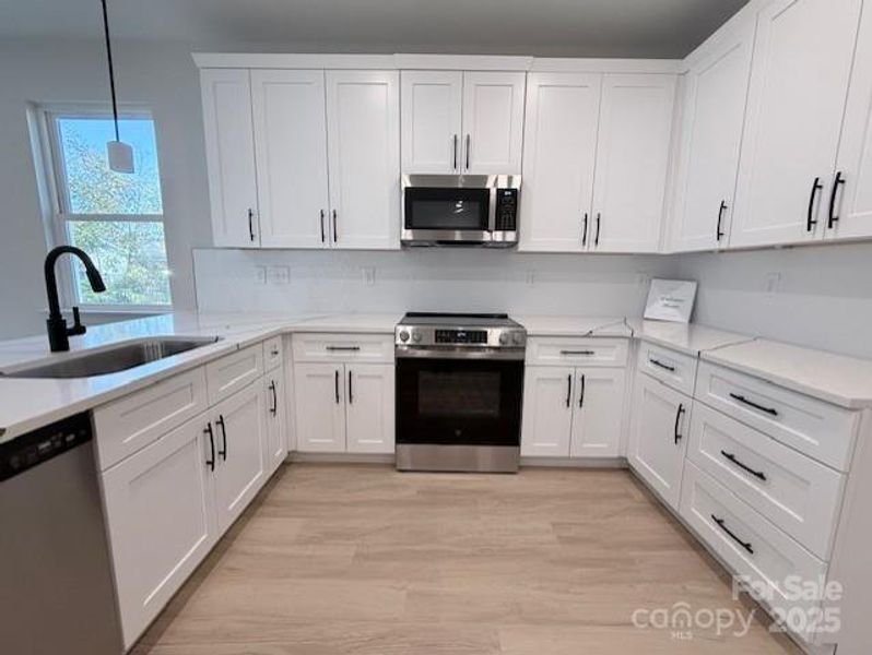 Furnished interior view inside a new home in , Gastonia (Image 14).