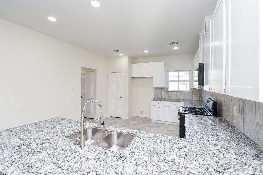 Furnished interior view inside a new home in , Houston (Image 12).