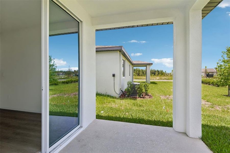 Exterior details and patio area of a home in Two Rivers - Classic Series, Zephyrhills (Image 24).