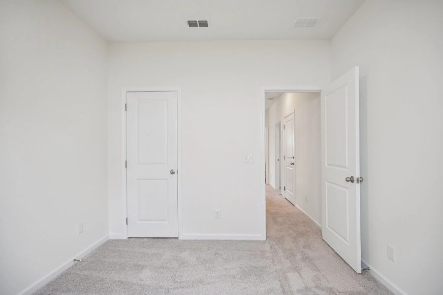 Representative unfurnished interior of a home built from the Larissa by Starlight Homes in Ashland, Angleton (Image 20). Representative unfurnished interior of a home built from the Larissa by Starlight Homes in Ashland, Angleton (Image 20).