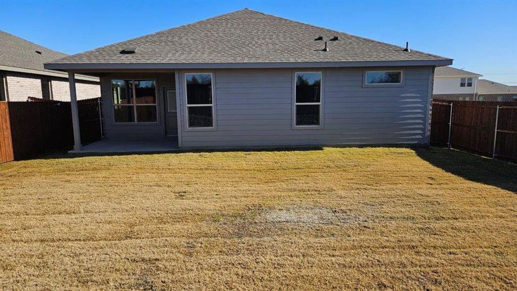 Exterior details and patio area of a home in Monarch at the Meadows, Denton (Image 2). Exterior details and patio area of a home in Monarch at the Meadows, Denton (Image 2).