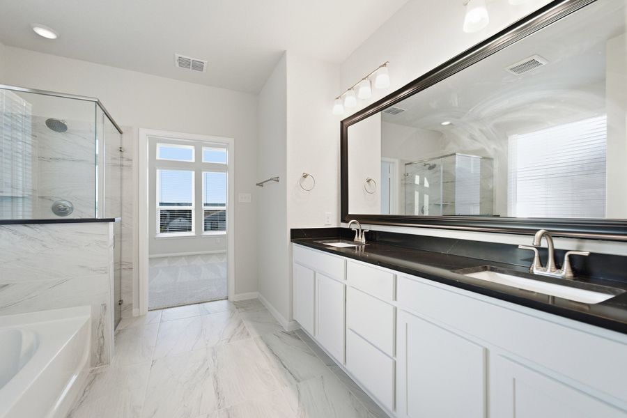 Furnished interior view inside a new home in The Woodlands at Medina Hills, Mico (Image 14).