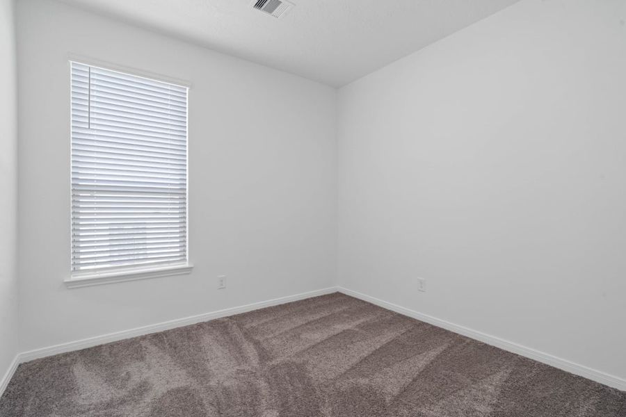Spacious, unfurnished interior of a new home in Mustang Ridge, Magnolia (Image 23).
