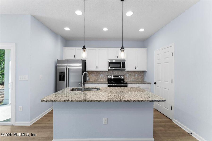 Furnished interior view inside a new home in , East Palatka (Image 4). Furnished interior view inside a new home in , East Palatka (Image 4).