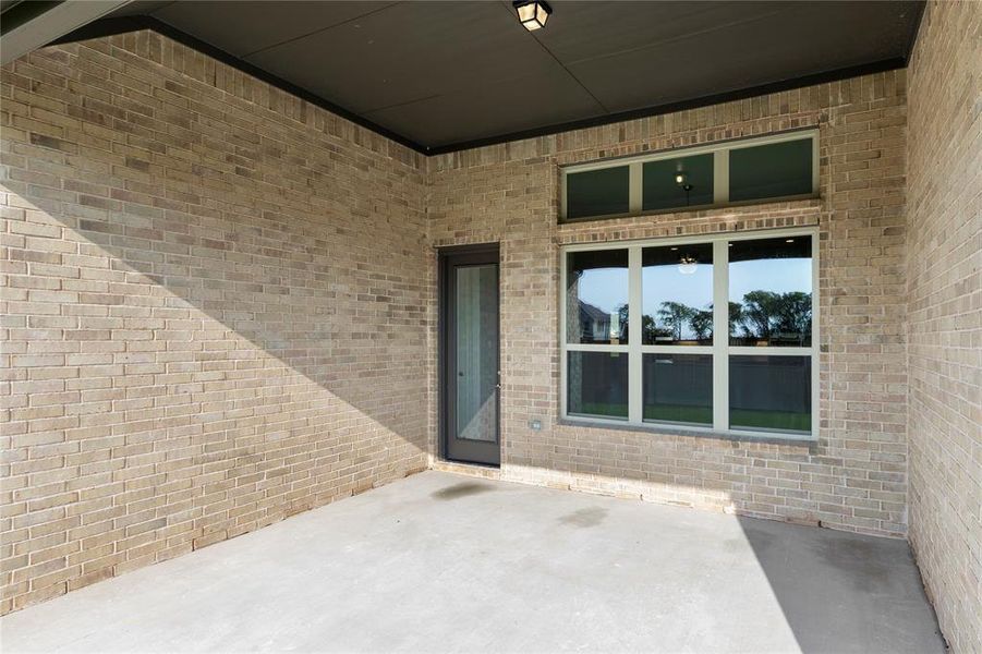 Exterior details and patio area of a home in River Ranch, Van Alstyne (Image 3). Exterior details and patio area of a home in River Ranch, Van Alstyne (Image 3).