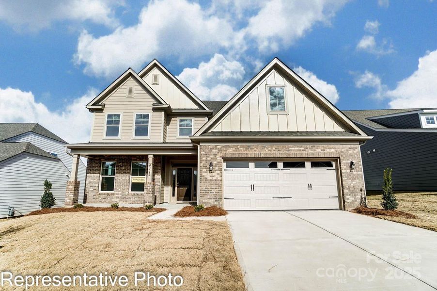 Homesite 31 features a Hamilton E floorplan with front load garage