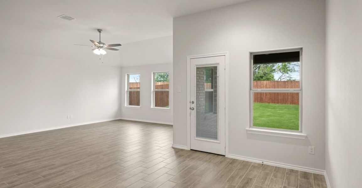Representative exterior photo of a completed home built from the Boston by Impression Homes in Baker Farms, Cleburne, TX (Image 12).
