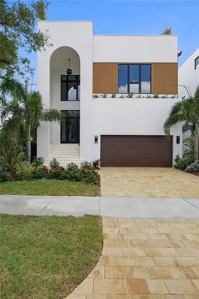 Front exterior of a new home in , Tampa, FL, highlighting curb appeal (Image 2). Front exterior of a new home in , Tampa, FL, highlighting curb appeal (Image 2).