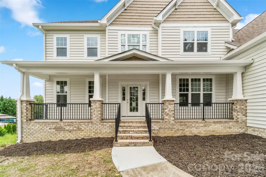 Exterior details and patio area of a home in , Concord (Image 3).