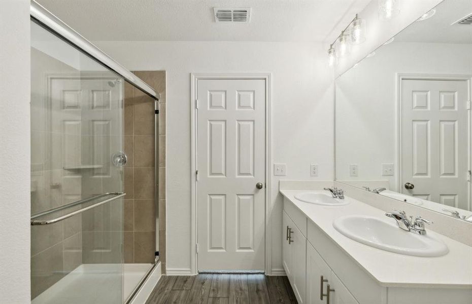 Owner's bathroom with oversized shower*real home pictured