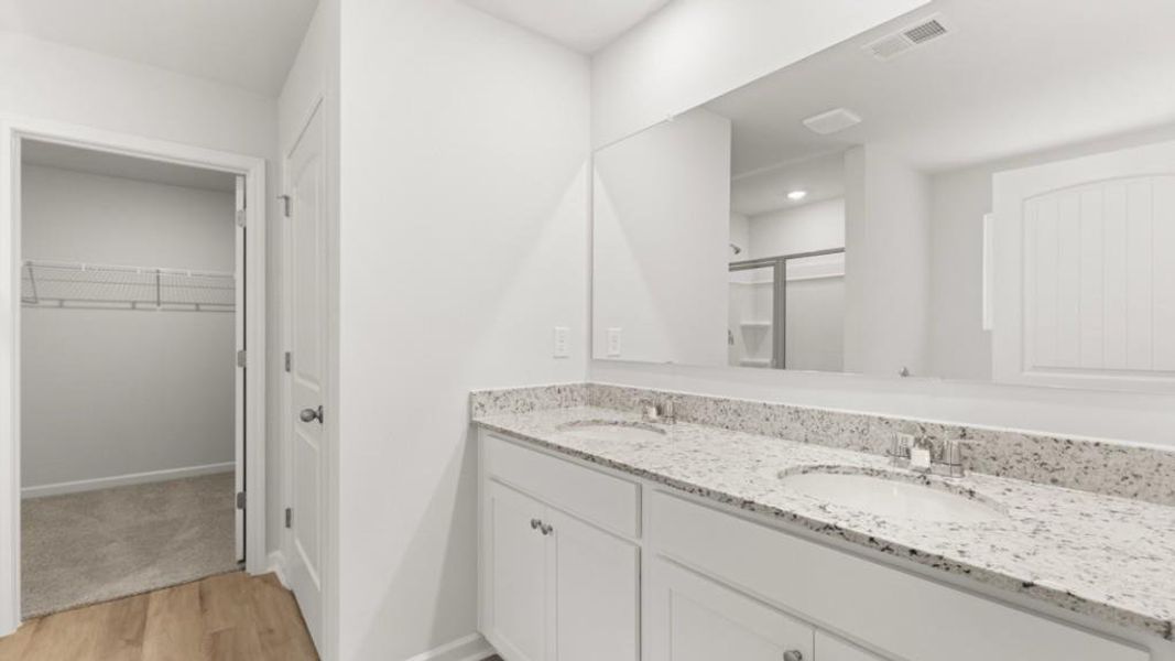 Furnished interior view inside a new home in Northwoods at Mirror Lake, Villa Rica (Image 5).