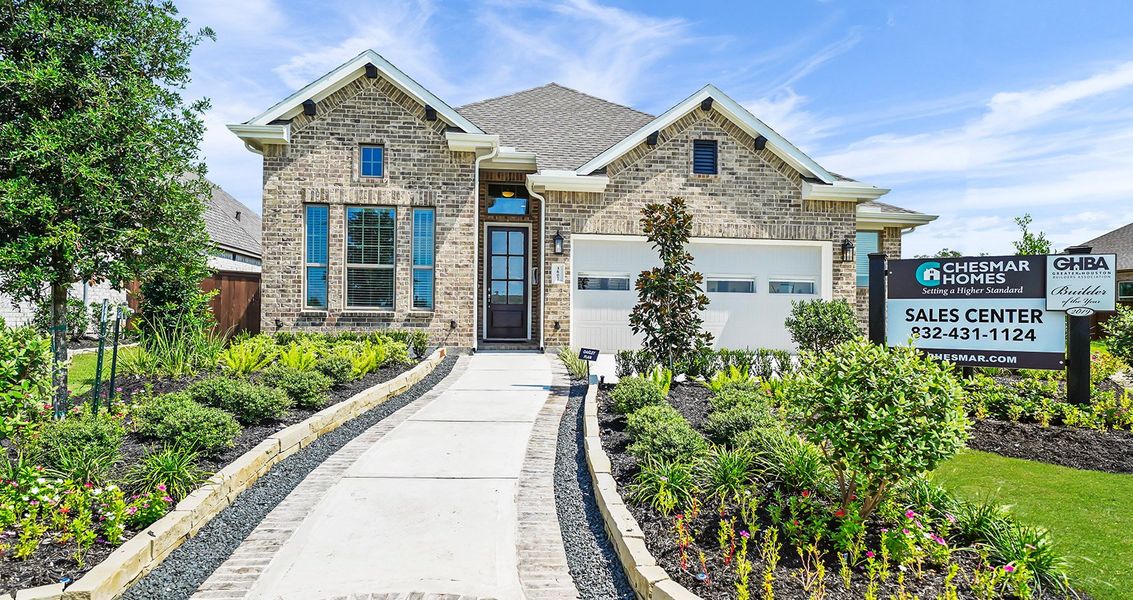 Representative exterior photo of a completed home built from the Oakley by Chesmar Homes in Artavia, Conroe, TX (Image 13).