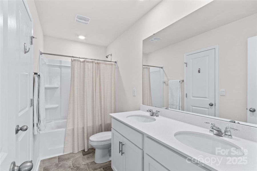 Furnished interior view inside a new home in Calvin Creek, Troutman (Image 7).