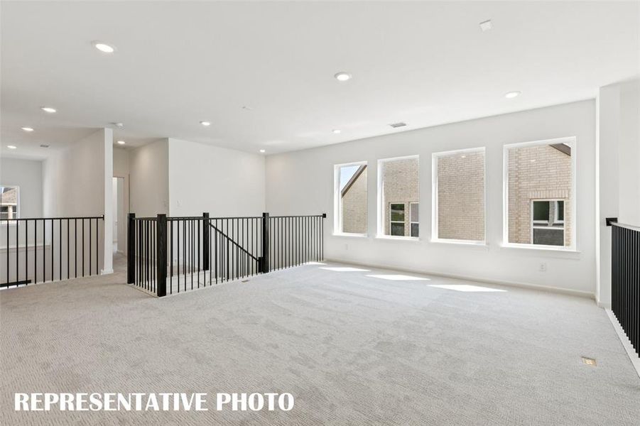 You new light filled game room is the perfect place to host the big game day parties or family game night get togethers!  REPRESENTATIVE PHOTO