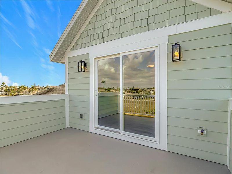 Exterior details and patio area of a home in , Hernando Beach (Image 36).