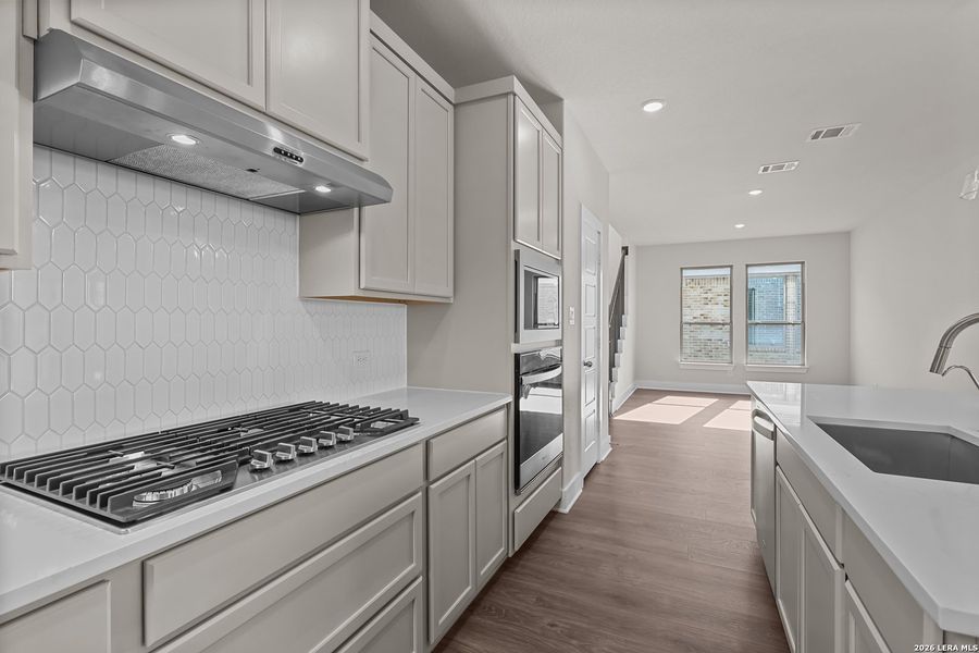 Furnished interior view inside a new home in Nopal Valley, San Antonio (Image 7).