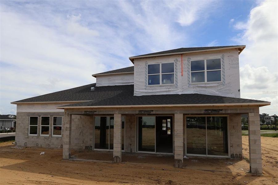 Exterior details and patio area of a home in Emerson Pointe, Apopka (Image 15). Exterior details and patio area of a home in Emerson Pointe, Apopka (Image 15).