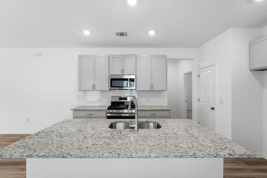 Furnished interior view inside a new home in Longview, Del Valle (Image 4).