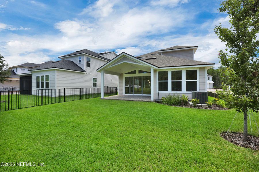 Exterior details and patio area of a home in Reflections at Nocatee, Ponte Vedra (Image 3).