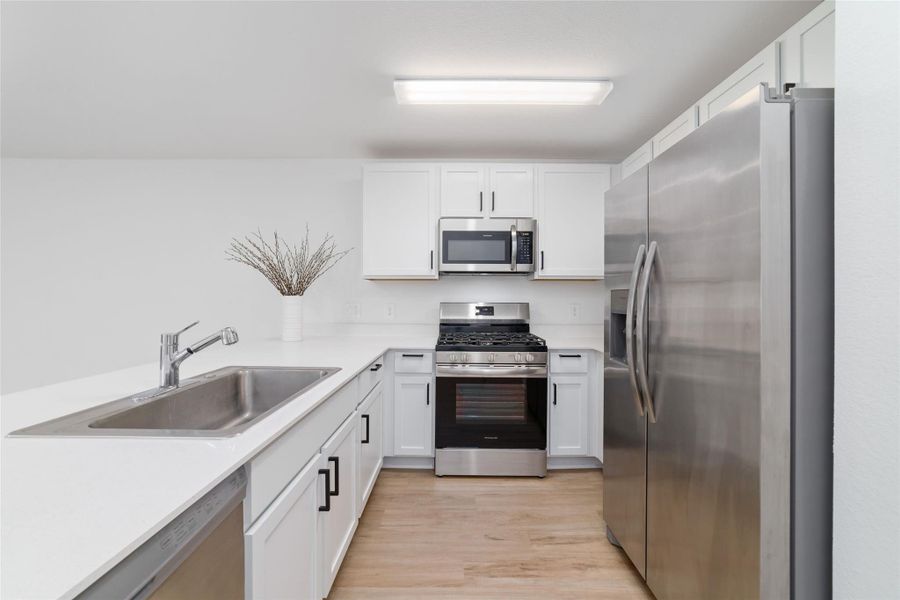 Furnished interior view inside a new home in Becker Landing, Hockley (Image 11).