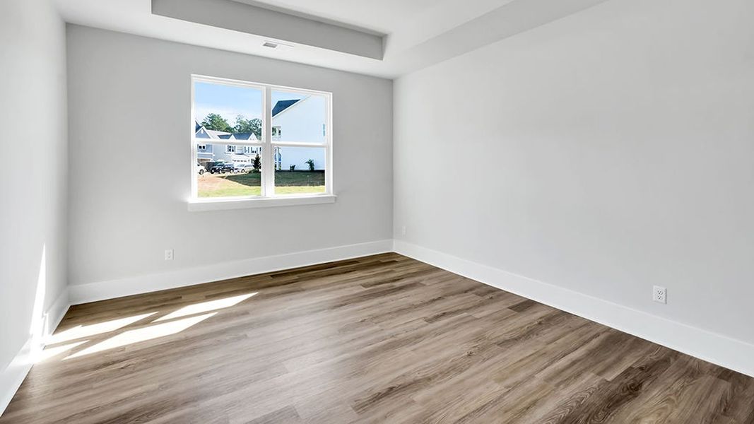 Spacious, unfurnished interior of a new home in The Haven at Indigo Preserve, Leland (Image 24).