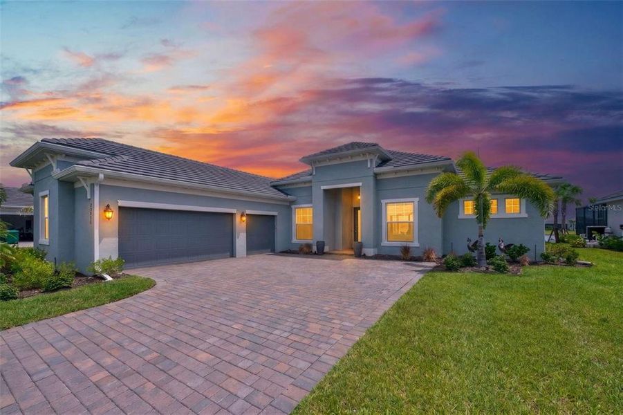 Front exterior of a new home in , Punta Gorda, FL, highlighting curb appeal (Image 1). Front exterior of a new home in , Punta Gorda, FL, highlighting curb appeal (Image 1).