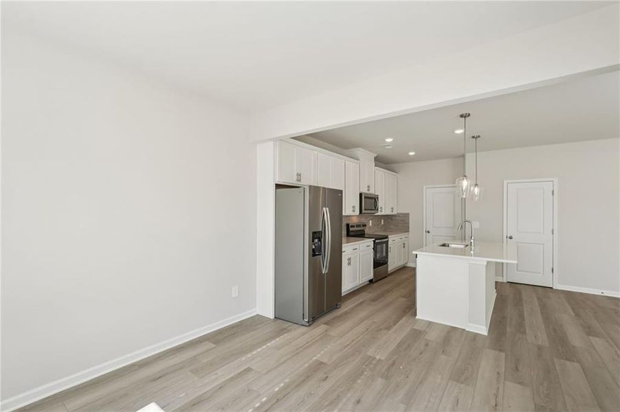 Furnished interior view inside a new home in Hawthorne Station, College Park (Image 6).