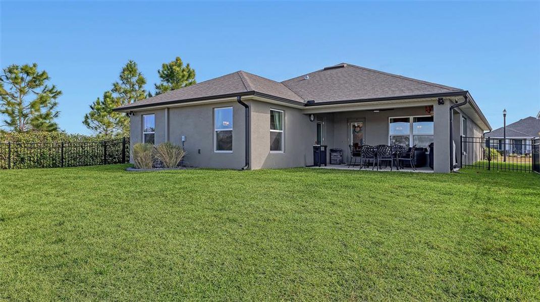 Exterior details and patio area of a home in Aviary at Rutland Ranch, Parrish (Image 3).