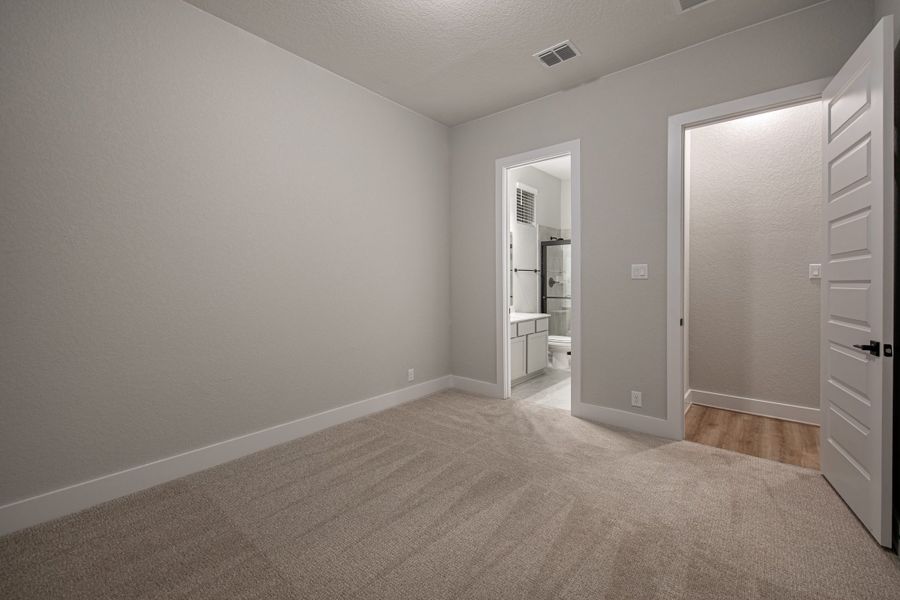Spacious, unfurnished interior of a new home in The Reserve at Potranco Oaks, Castroville (Image 31).