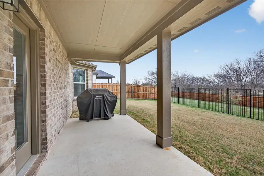 Exterior details and patio area of a home in Sagebrook, Denton (Image 3).