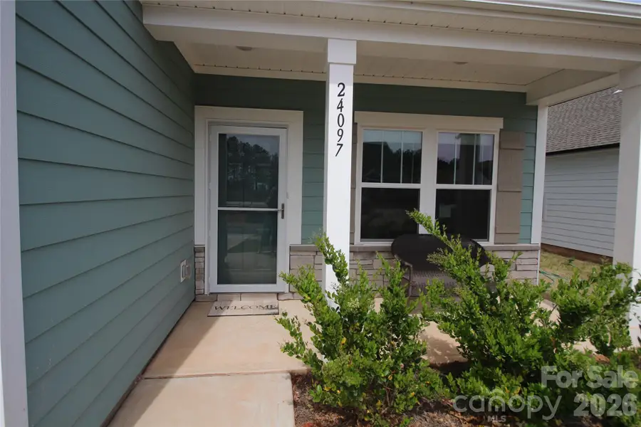 Exterior details and patio area of a home in Edgewater Lakeview On Your Lot, Lancaster (Image 4).