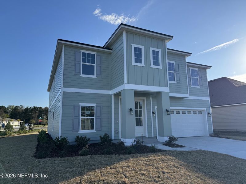 Front exterior of a new home in Hyland Trail, Green Cove Springs, FL, highlighting curb appeal (Image 7). Front exterior of a new home in Hyland Trail, Green Cove Springs, FL, highlighting curb appeal (Image 7).