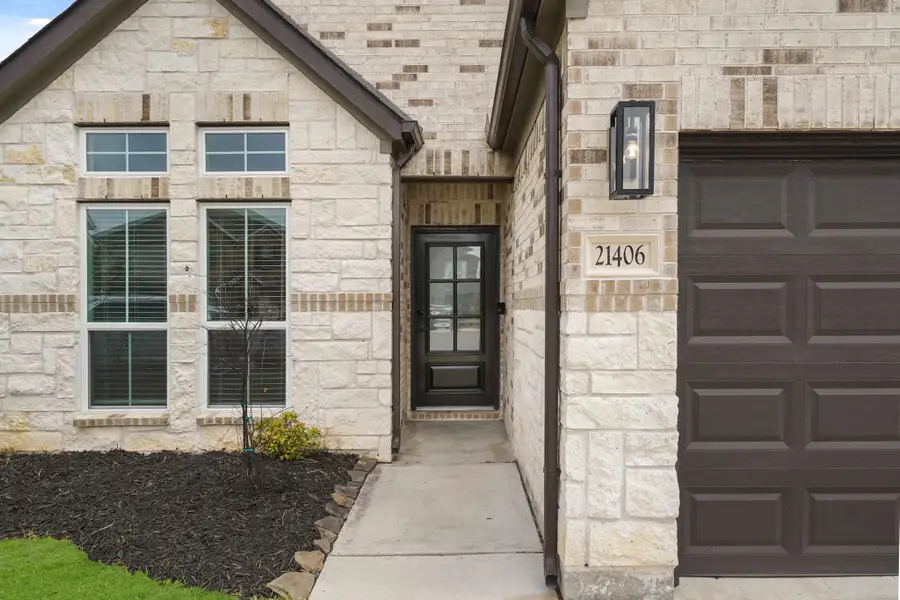 This gorgeous home has an inviting entrance that welcomes your family, friends, and guests.