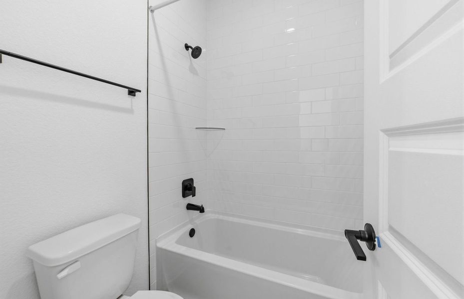 Furnished interior view inside a new home in West Cypress Hills, Spicewood (Image 14).