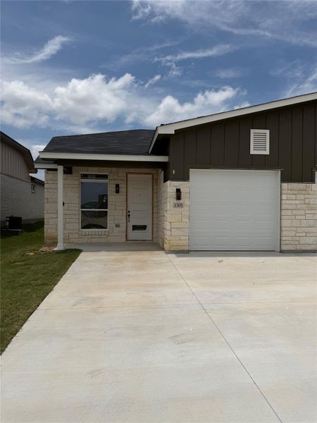 Front exterior of a new home in , Killeen, TX, highlighting curb appeal (Image 1). Front exterior of a new home in , Killeen, TX, highlighting curb appeal (Image 1).