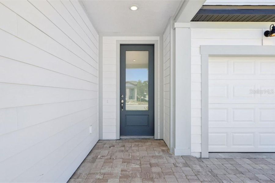 Exterior details and patio area of a home in Northlake Traditional, Winter Garden (Image 15). Exterior details and patio area of a home in Northlake Traditional, Winter Garden (Image 15).